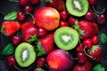 Summer juicy ripe Strawberry, cherry, kiwi and peaches On a black background closeup. Top view