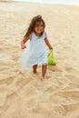 Summer. Kid On Beach Portrait. Cute Little Girl With Curly Hair Carrying Watermelon In Eco Bag. Royalty Free Stock Photo