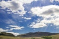 Summer landscape with beautiful clouds against a bright blue sky Royalty Free Stock Photo