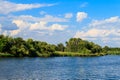 Summer landscape with beautiful lake, green trees and blue sky Royalty Free Stock Photo