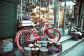 Urban bike parked to a flower shop Royalty Free Stock Photo