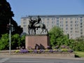 View of bright flowers and monument in Turku, Finland