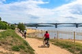 Russia Kostroma July 2020. Cyclists on the walking path along the Volga River.