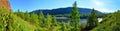 Summer landscape. Distant Siberian mountains and the cold river Uda.