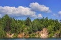 Summer landscape. Forest lake under blue cloudy sky Royalty Free Stock Photo