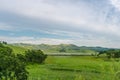 Valley with a lake among green hills. Royalty Free Stock Photo