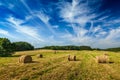 Summer Landscape with Hay Bales on Field Royalty Free Stock Photo