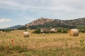 Summer landscape with hay bales and Subasio mountain in the background Royalty Free Stock Photo