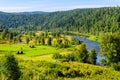 Summer landscape with haystacks in the mountains Royalty Free Stock Photo