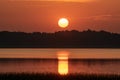 Summer landscape on the lake at dawn, dusk, colors of the sky before sunrise, sunrise on the lake, Lake Burtnieki, Latvia Royalty Free Stock Photo