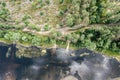 Summer landscape. lakeside with clouds reflection and green forest on the coast. aerial view