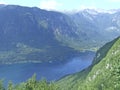 Mountains covered with forest and lake. Mountain panorama with forest and river Royalty Free Stock Photo