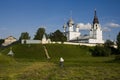 Summer landscape with an old monastery and walking nun Royalty Free Stock Photo