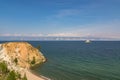 Summer landscape of Olkhon island. View of Cape Haraldai and Edor Island. In the distance, the mountainous western shore of Lake