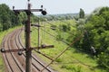 Summer landscape with railway and wires Royalty Free Stock Photo
