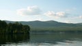 Summer landscape with river, cloudy sky, forest and sun timelapse. summer landscape with river and blue sky time lapse Royalty Free Stock Photo