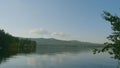 Summer landscape with river, cloudy sky, forest and sun timelapse. summer landscape with river and blue sky time lapse Royalty Free Stock Photo