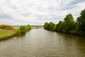 Summer landscape with a river, fields