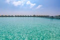 Summer landscape and seascape as aerial tropical background. Amazing view from above, luxury water bungalows Royalty Free Stock Photo