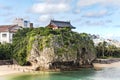 Summer landscape of the Shinto Shrine Naminoue at the top of a cliff overlooking the beach and ocean of Naha in Okinawa Prefecture Royalty Free Stock Photo