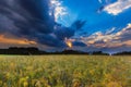 Summer landscape with stormy sky over fields Royalty Free Stock Photo