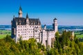 View of the famous tourist attraction in the Bavarian Alps - the 19th century Neuschwanstein castle Royalty Free Stock Photo