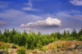Summer landscape view of the mountains covered with forest against the blue sky Royalty Free Stock Photo