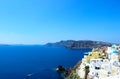 Summer landscape: whitewashed houses, church, sea and rocks. Santorini Island Greece. Royalty Free Stock Photo