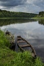 Summer landscape with wooden fishing boats by the lake Royalty Free Stock Photo