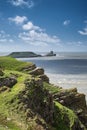 Summer landscape of Worm's Head and Rhosilli Bay in Wales