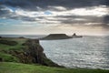 Summer landscape of Worm's Head and Rhosilli Bay in Wales