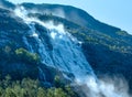 Summer Langfossen waterfall (Norway). Royalty Free Stock Photo