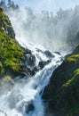 Summer Latefossen waterfall on mountain slope (Norway). Royalty Free Stock Photo