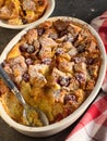 Summer leftovers bread and fruits pudding on a table