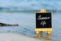 Summer Life board on a beach. Royalty Free Stock Photo