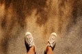 Summer Lifestyle Concept. a Young Man in Sneakers Shoes Standing Against the Hot Sunlight. Top View. Shadow of Tree shaded on the