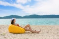 Summer lifestyle happy young girl with tanned sexy body. Tropical island beach. Wearing stylish bikini and sunglass Royalty Free Stock Photo