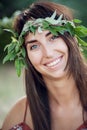 Summer lifestyle portrait of beautiful romantic girl holding bouquet of wild flowers Royalty Free Stock Photo