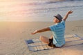 Summer lifestyle portrait male joy on the beach at the seashore life style morning at the sunrise, concept in travel Royalty Free Stock Photo