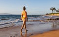 Summer lifestyle pretty young woman with tanned sexy body. Enjoying life in the clear sea water on the beach of the Royalty Free Stock Photo