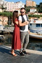 Summer love story in Italy. Couple on the pier Royalty Free Stock Photo
