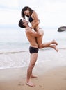 Summer lovin. an affectionate young couple at the beach. Royalty Free Stock Photo