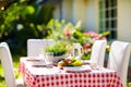 Summer lunch outdoors. Table setting for barbecue Royalty Free Stock Photo
