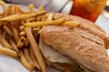 Turkey club sandwich with french fries and ice tea. Royalty Free Stock Photo