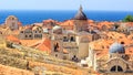 Summer mediterranean cityscape - view of the old roof on the background of the Old Town of Dubrovnik