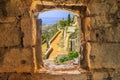 Summer mediterranean landscape - top view from the window opening to the Klis Fortress and the city of Split