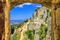 Summer mediterranean landscape - view from the loophole of the tower to the Klis Fortress near the city of Split Royalty Free Stock Photo