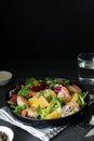 Summer mix salad with shrimps, oranges, olive oil and sesame seeds, horizontal photo copy space Royalty Free Stock Photo