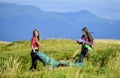 Summer mood. family camping. reach destination place. hiking outdoor adventure. mountain tourism camp. two girls pitch