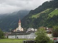 Summer morning foggy view on Neustift im Stubaital church at Stubaital or Stubai Valley near Innsbruck, Austria, green